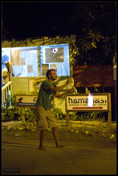 Backpacker playing with fire