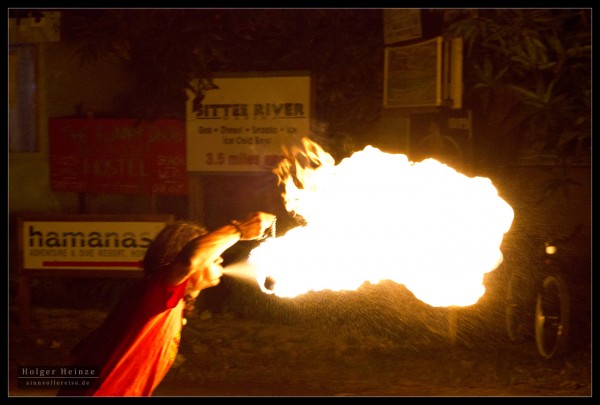 Backpacker eating fire